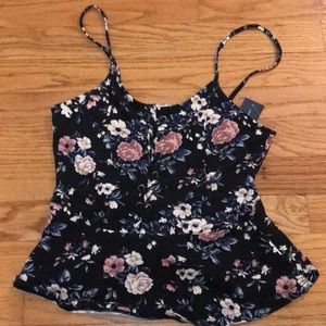 Black camisole top with a floral print.
